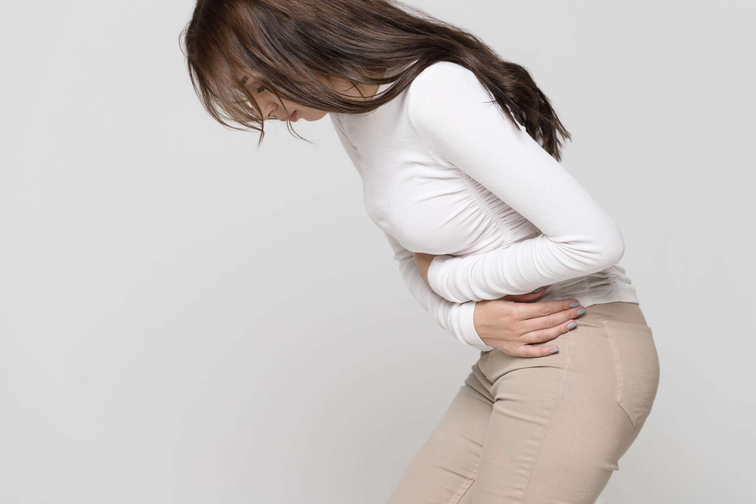 Woman Having a Stomachache, Menstruation Pain or Cramps